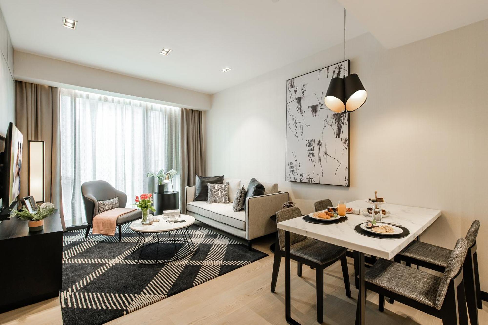 Hotel Ascott Star Klcc Kuala Lumpur Exterior foto A living room in a serviced apartment in Hong Kong